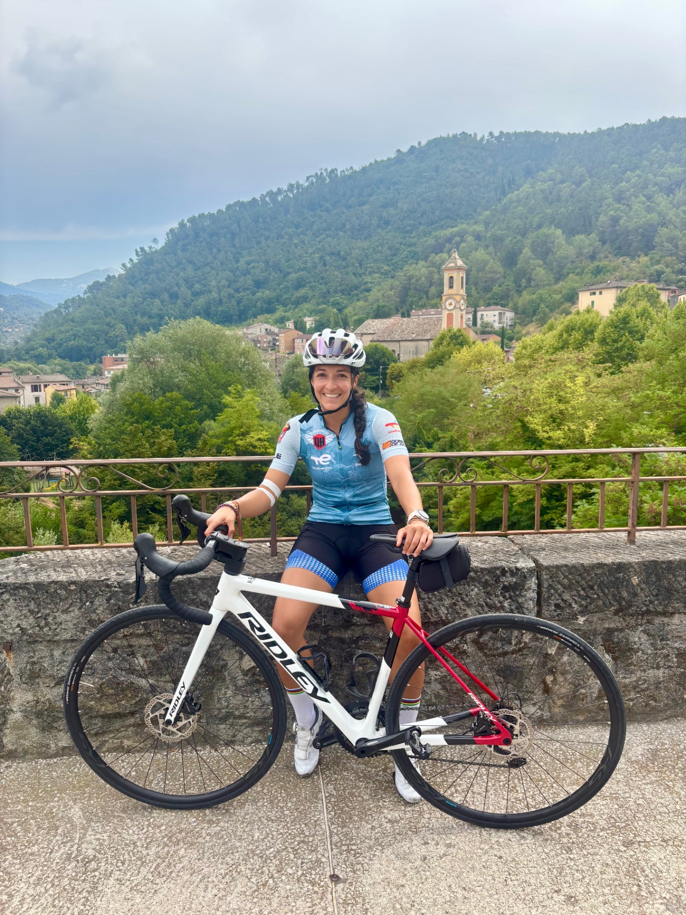 Valentina, Narü founder, on her bike in the European mountains